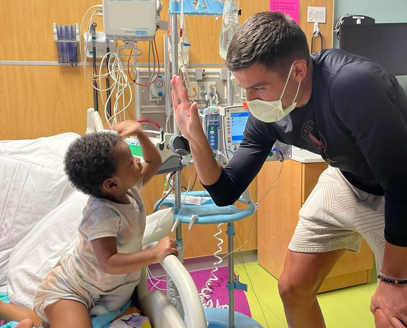 Young brain tumor patient & nurse reunite at Atlanta United game