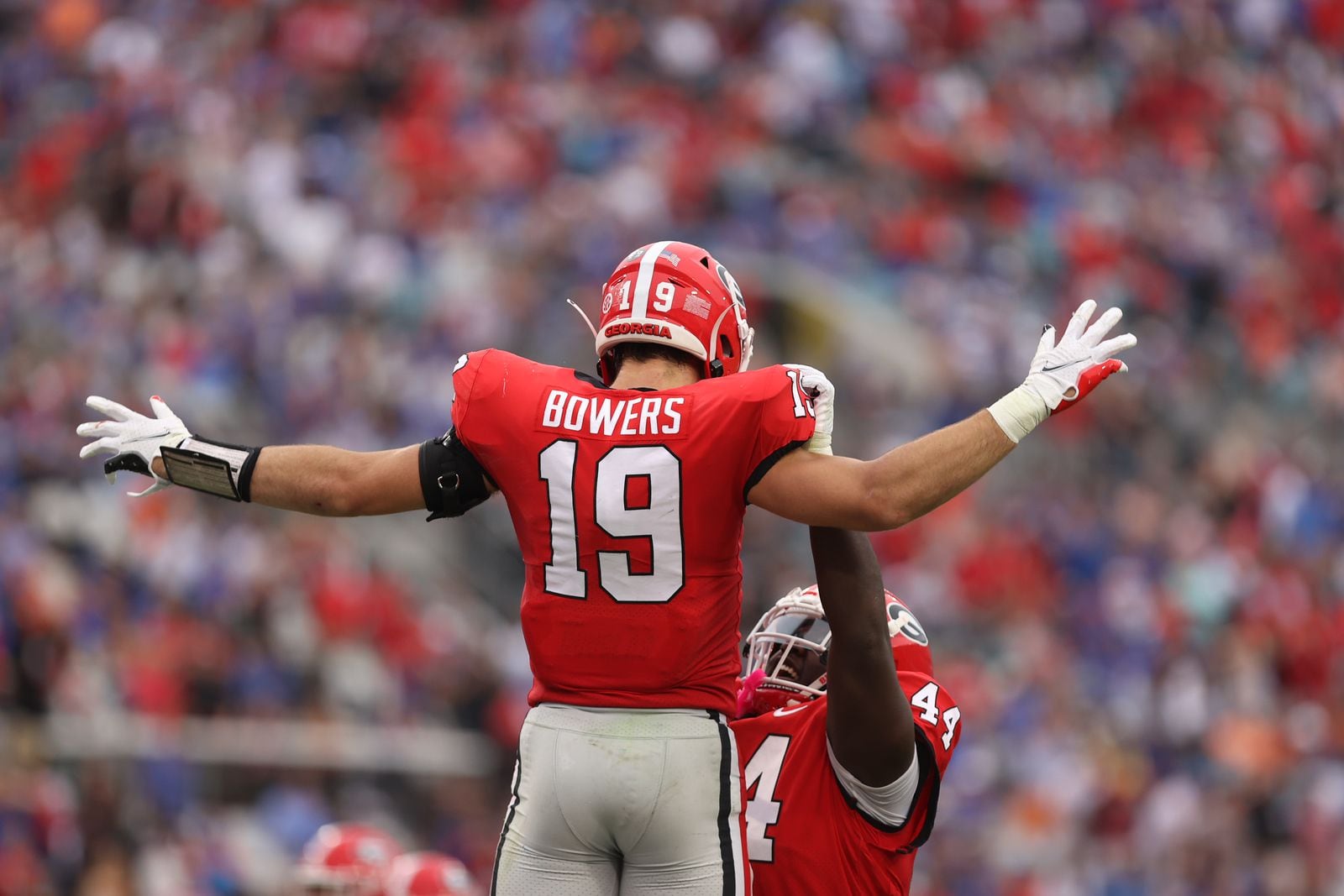 Brock Bowers Georgia Bulldogs Football White Uniform Student