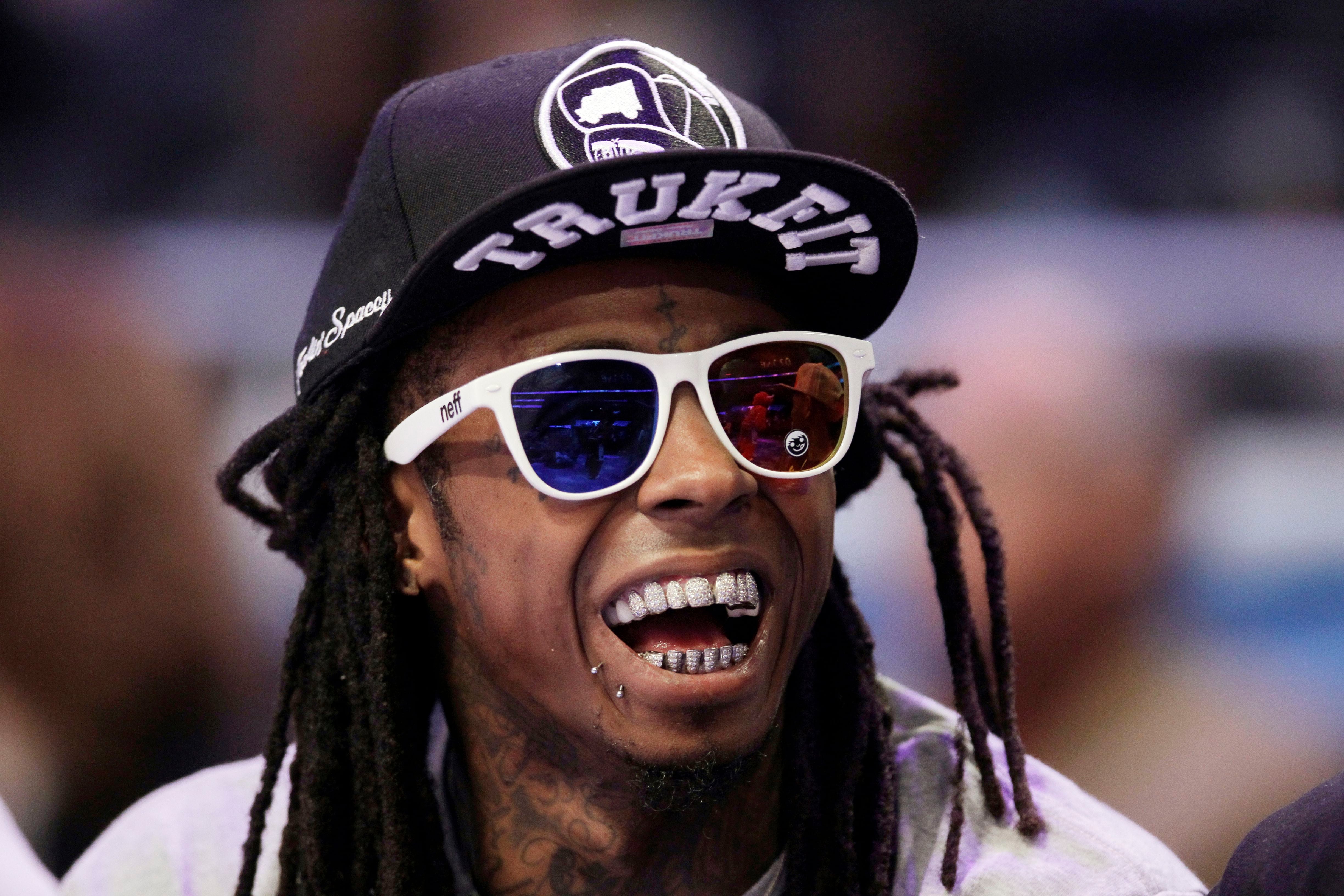 lil wayne before and after teeth
